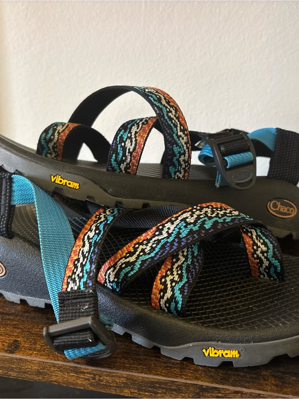 Chaco women’s Multicolor Patterned Strap Sandals with Teal Accents